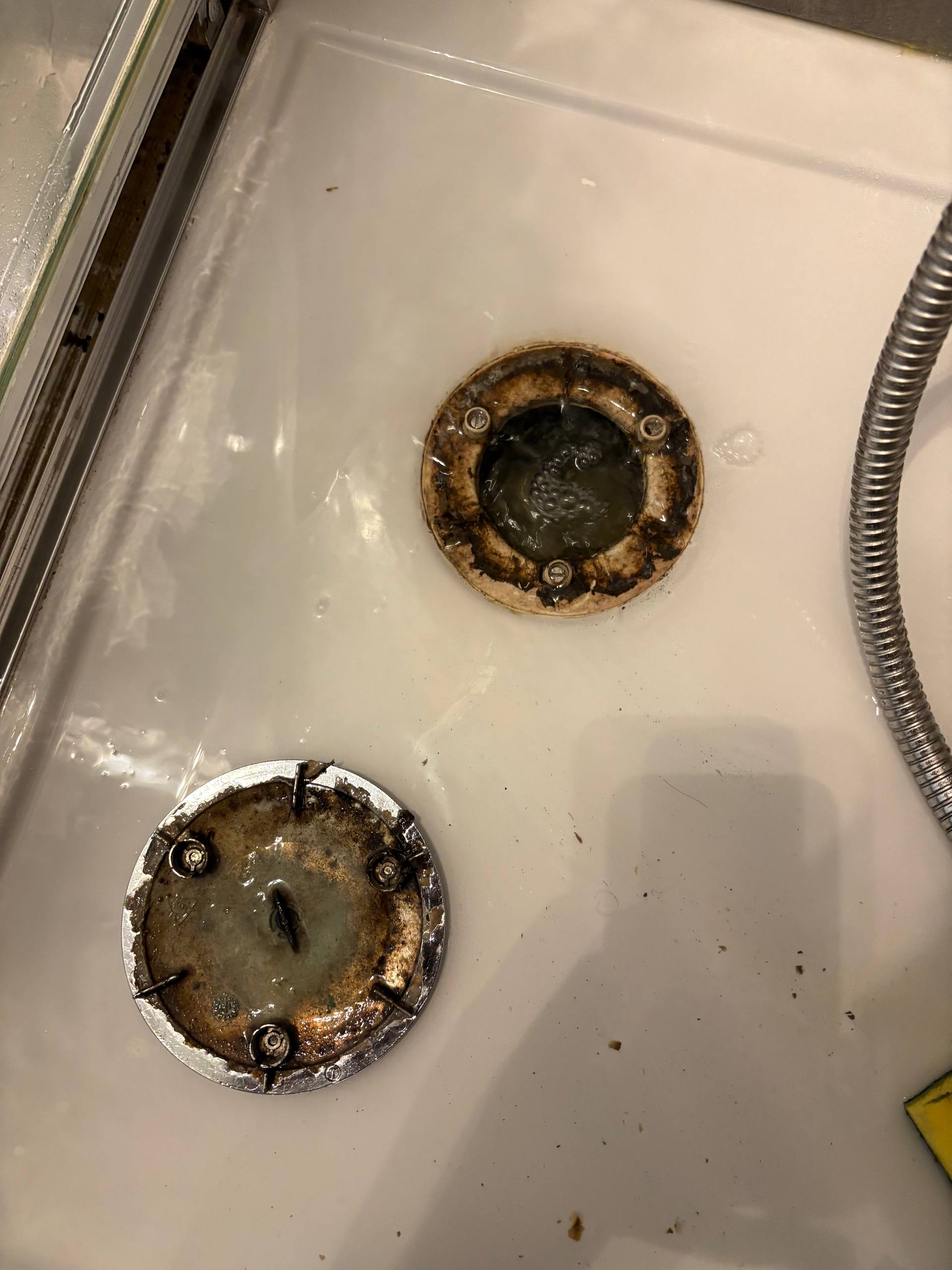 Gas hob burner caps removed during deep cleaning